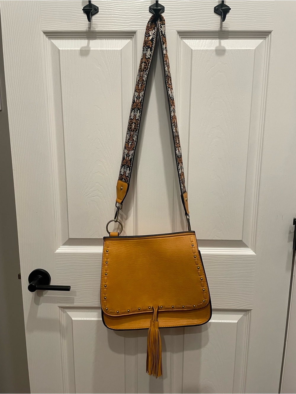 Jen & Co Mustard Yellow Tassel Crossbody Bag with Patterned Strap